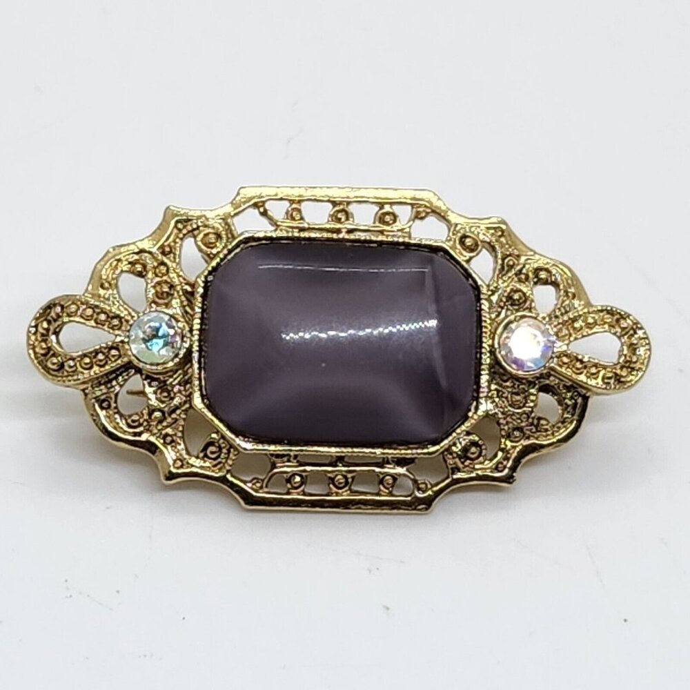 Vintage 1928 Purple Stone Gold Tone Brooch With Aurora Borialis Rhinestones
